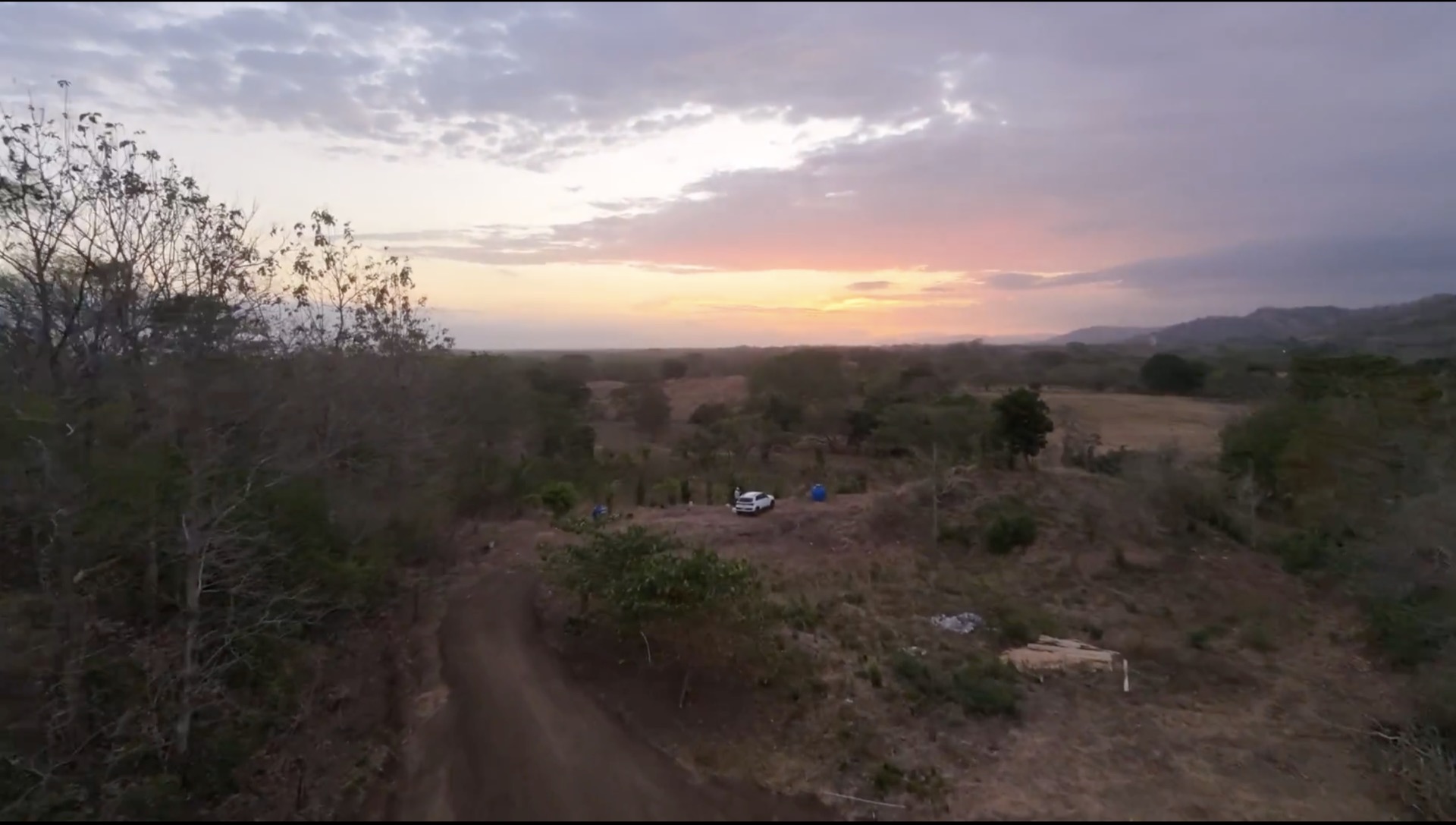 Real drone photo of the land at sunset